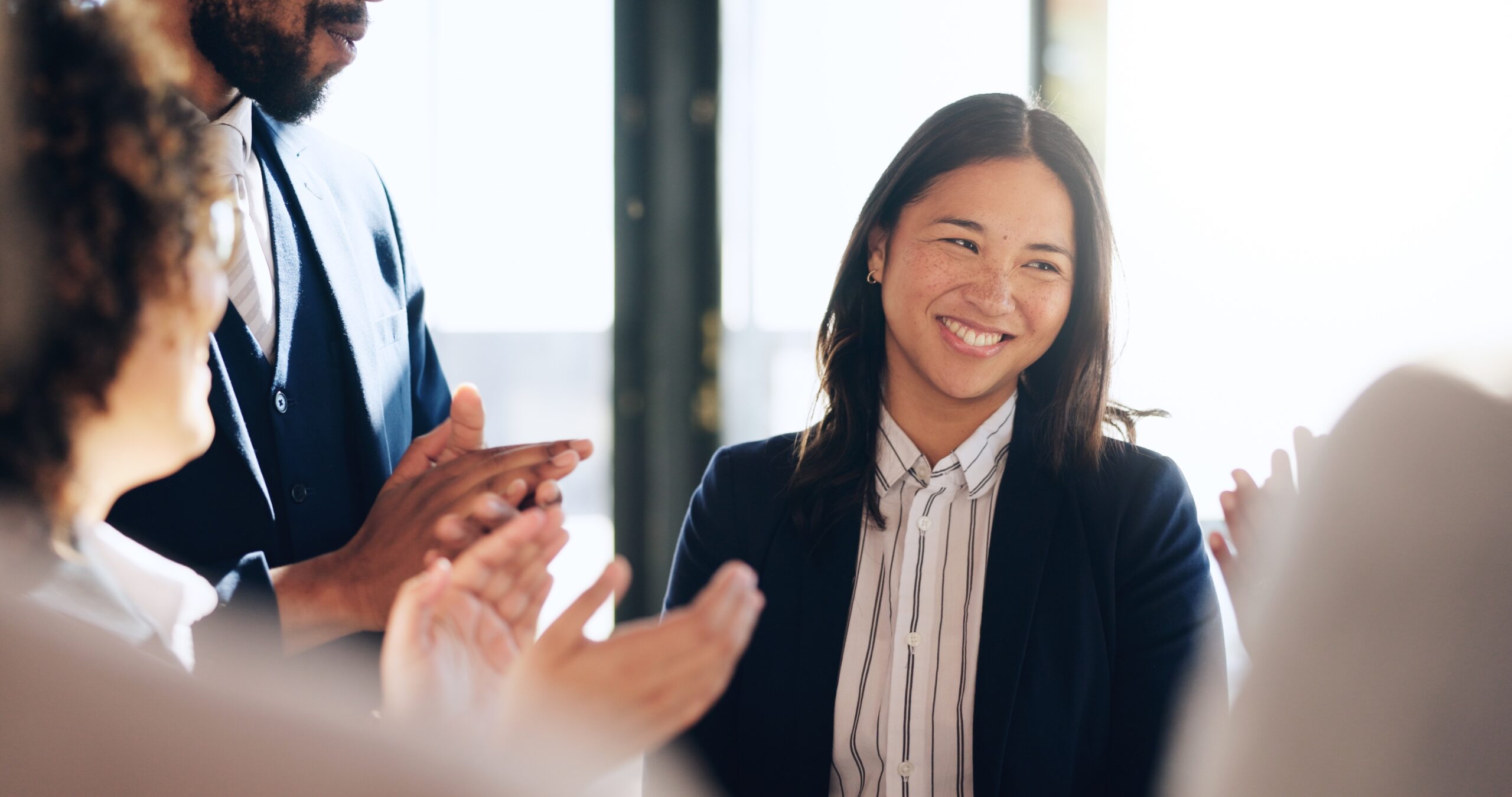 Woman securing a promotion at work